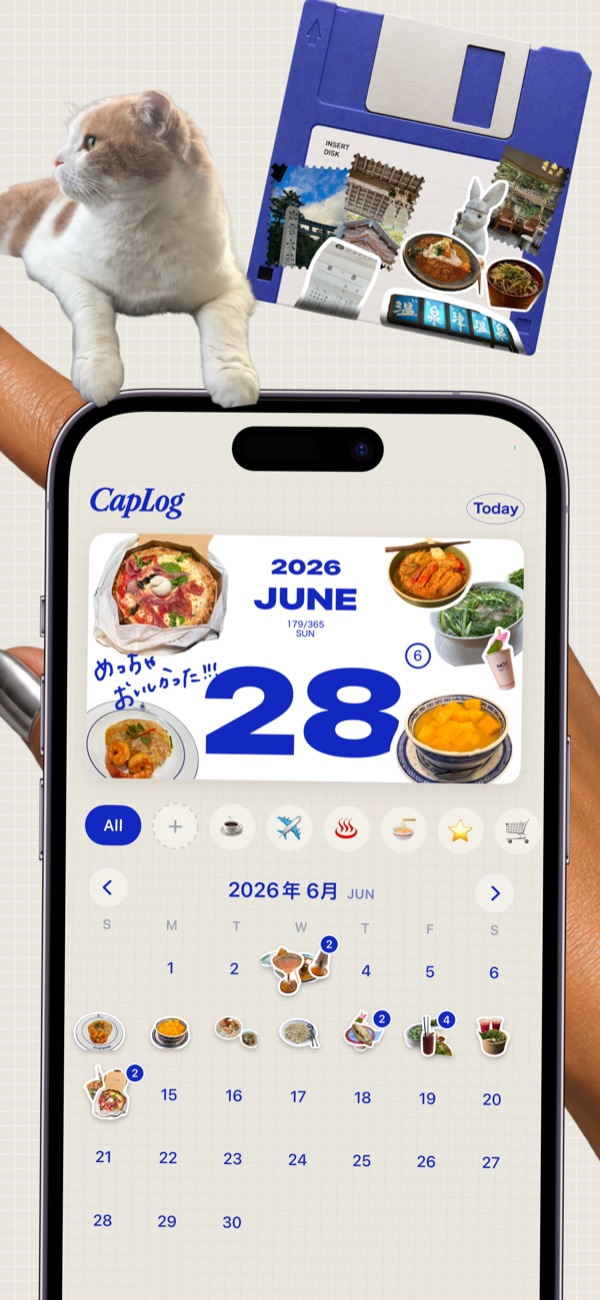 カレンダーにシールがたまっていく画面（猫とフロッピーのシール）